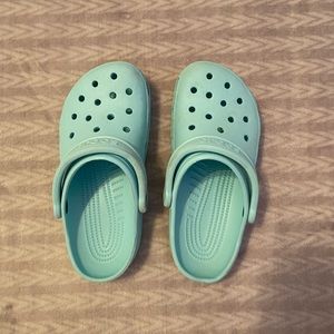 Teal Crocs size 6